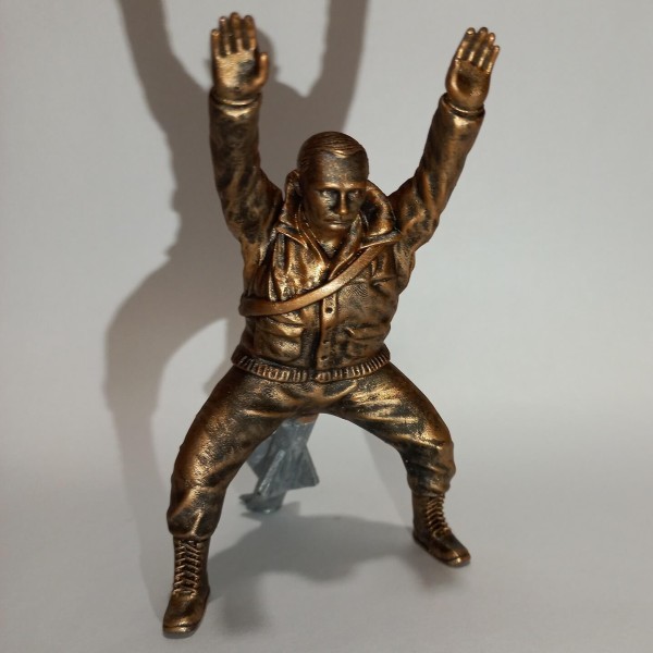 Статуетка «путін з ракетою в дупі»